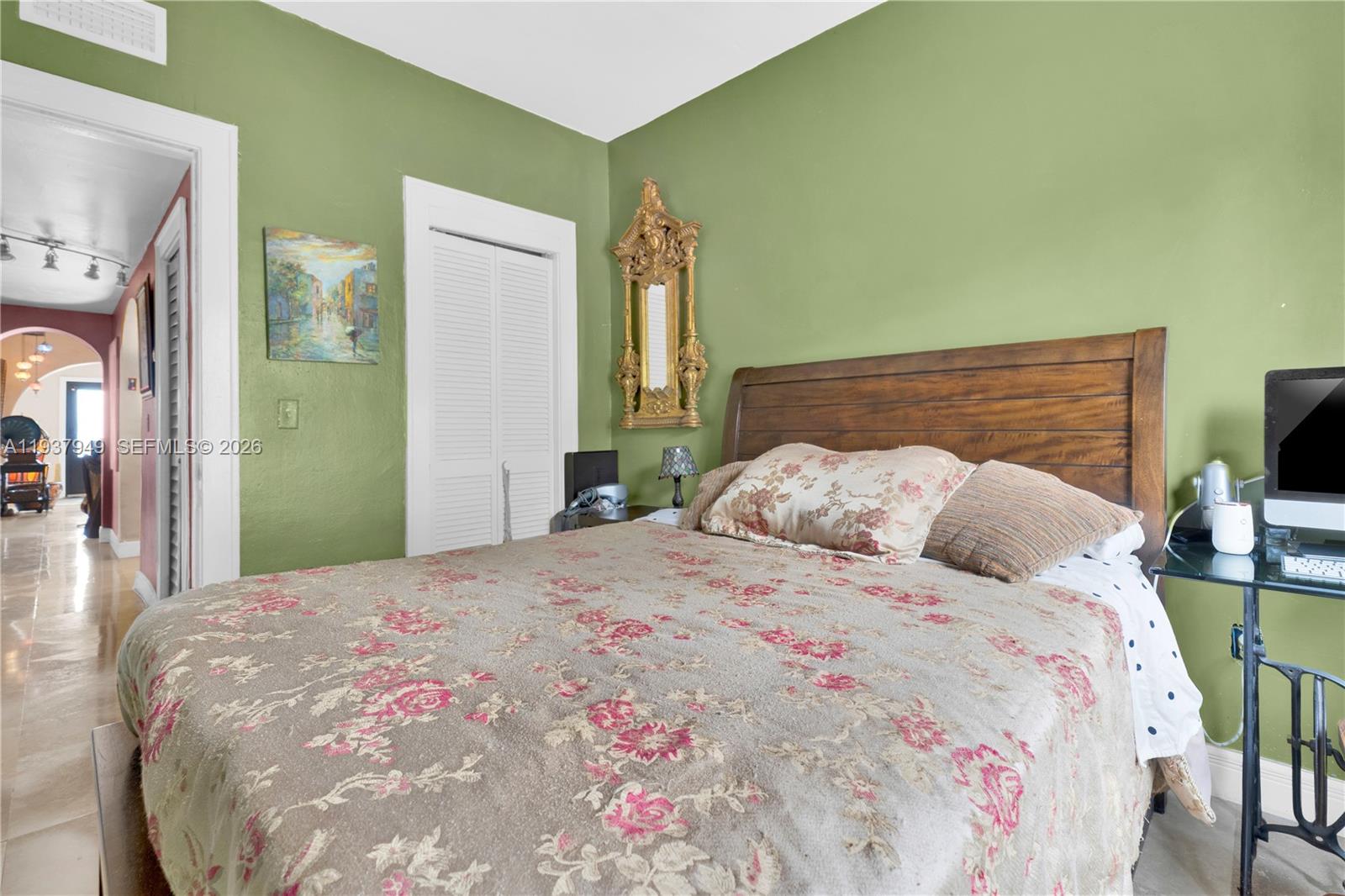 4739 Southwest 5th Street Miami, FL 33134 - Photo 37 of 40 a bedroom with a bed and a flat screen tv