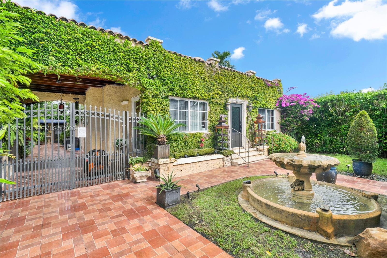 4739 Southwest 5th Street Miami, FL 33134 - Photo 9 of 40 a view of a house with backyard and sitting area