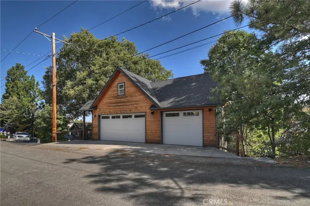 a view of balcony with a table and chairs