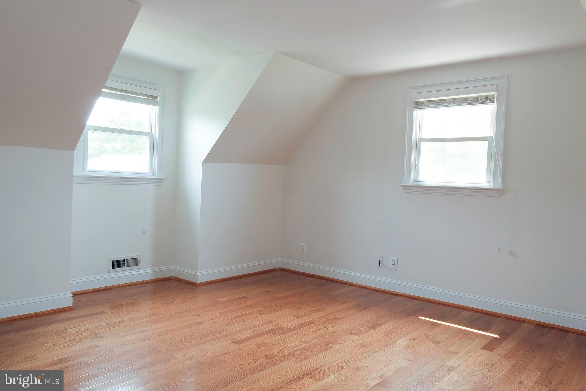 12720 Feldon Street Silver Spring, MD 20906 - Photo 3 of 13 an empty room with a window