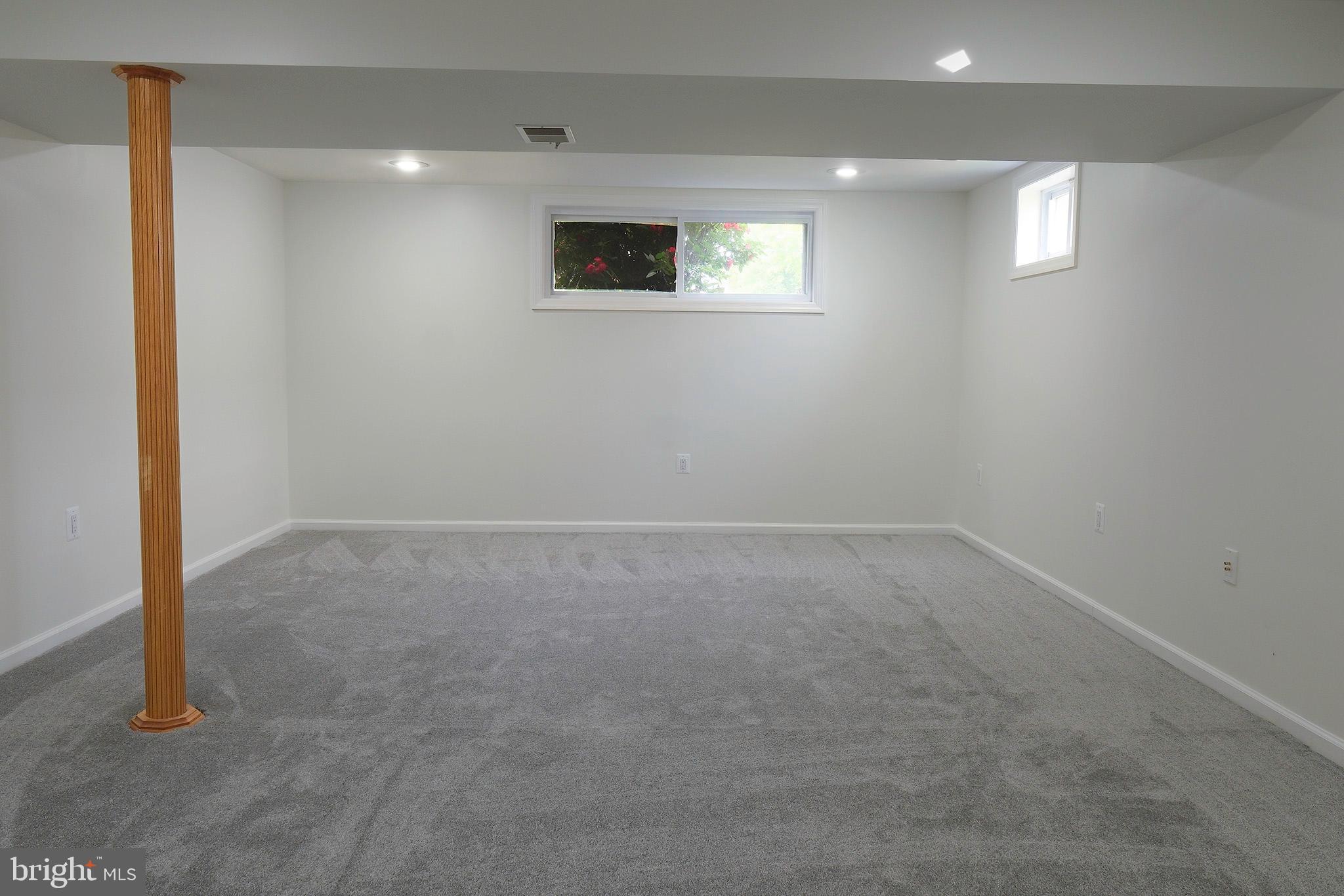 12720 Feldon Street Silver Spring, MD 20906 - Photo 6 of 13 an empty room with windows
