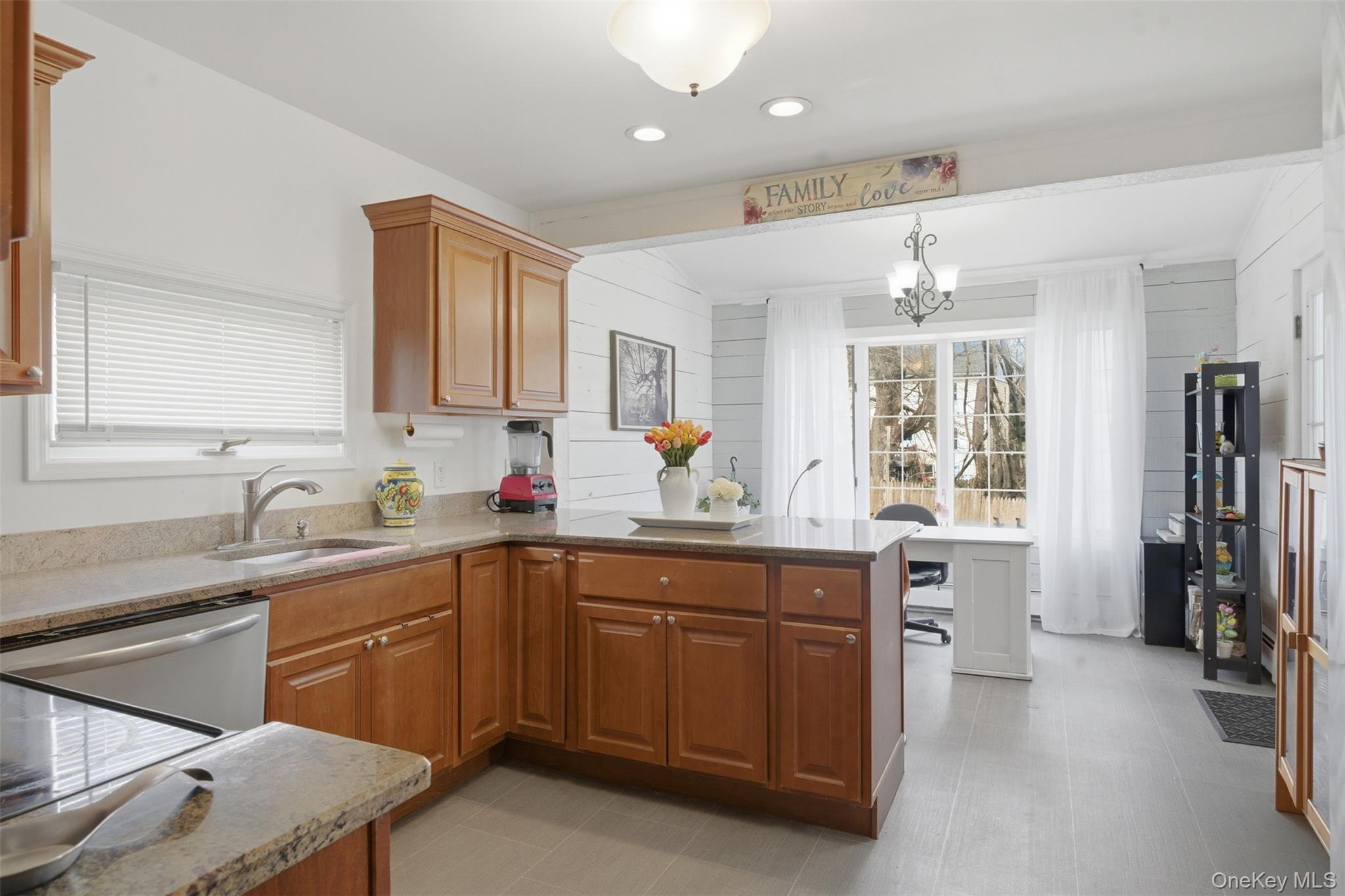 64 Wait Street Walden, NY 12586 - Photo 15 of 26 a kitchen with a sink stove and cabinets