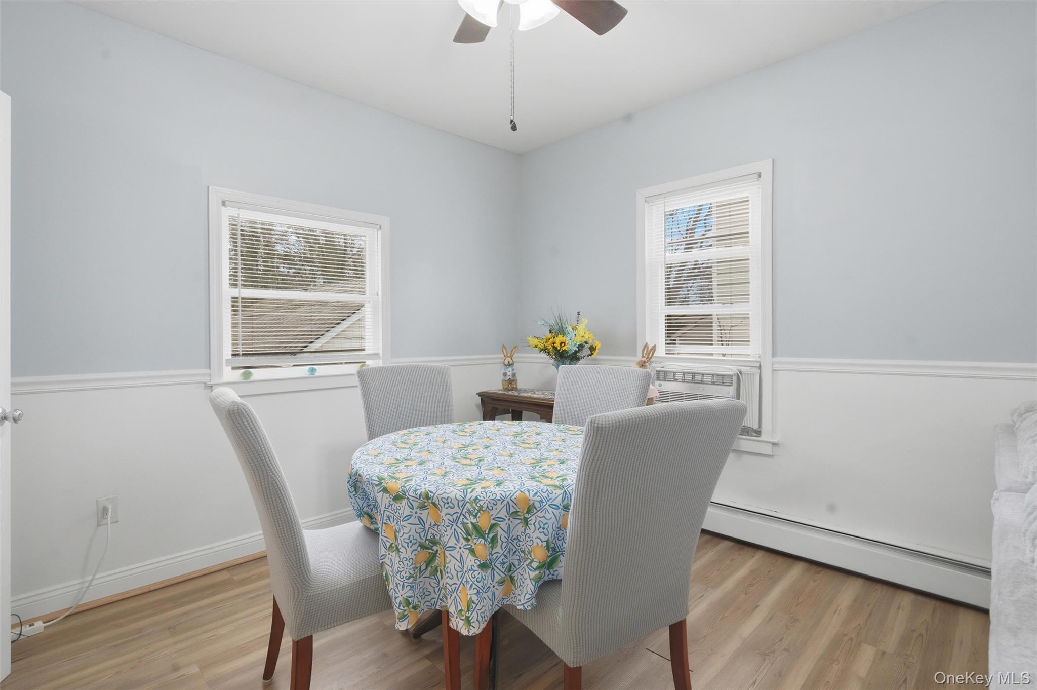 64 Wait Street Walden, NY 12586 - Photo 19 of 26 a view of a dining room with furniture window and wooden floor