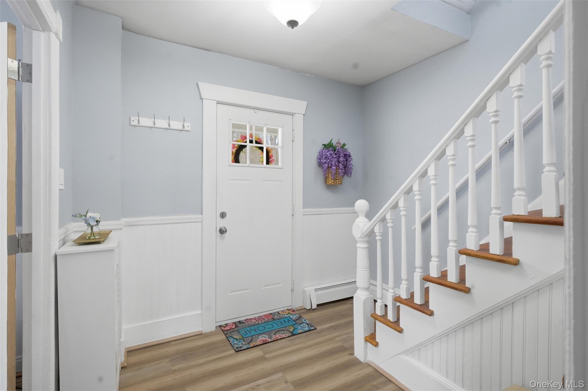 64 Wait Street Walden, NY 12586 - Photo 5 of 26 a view of entryway with stairs and wooden floor