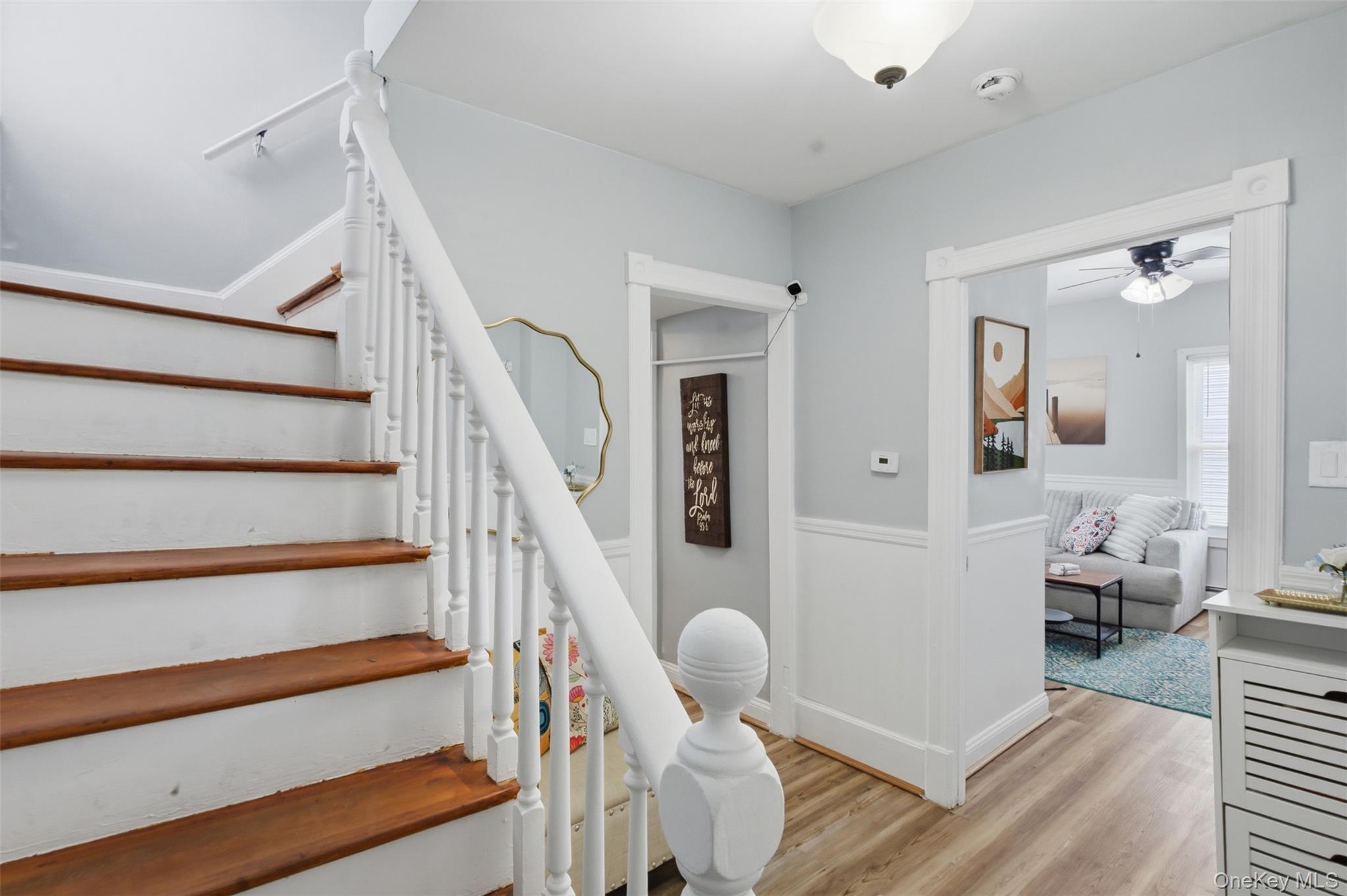 64 Wait Street Walden, NY 12586 - Photo 6 of 26 a living room with furniture and stairs