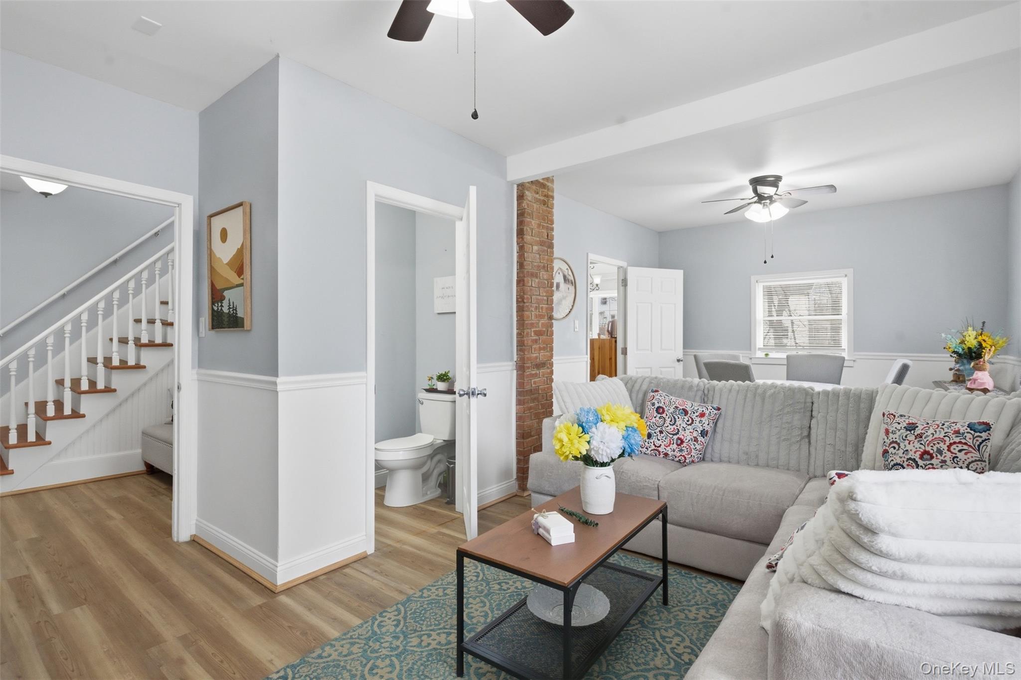 64 Wait Street Walden, NY 12586 - Photo 7 of 26 a living room with furniture and wooden floor