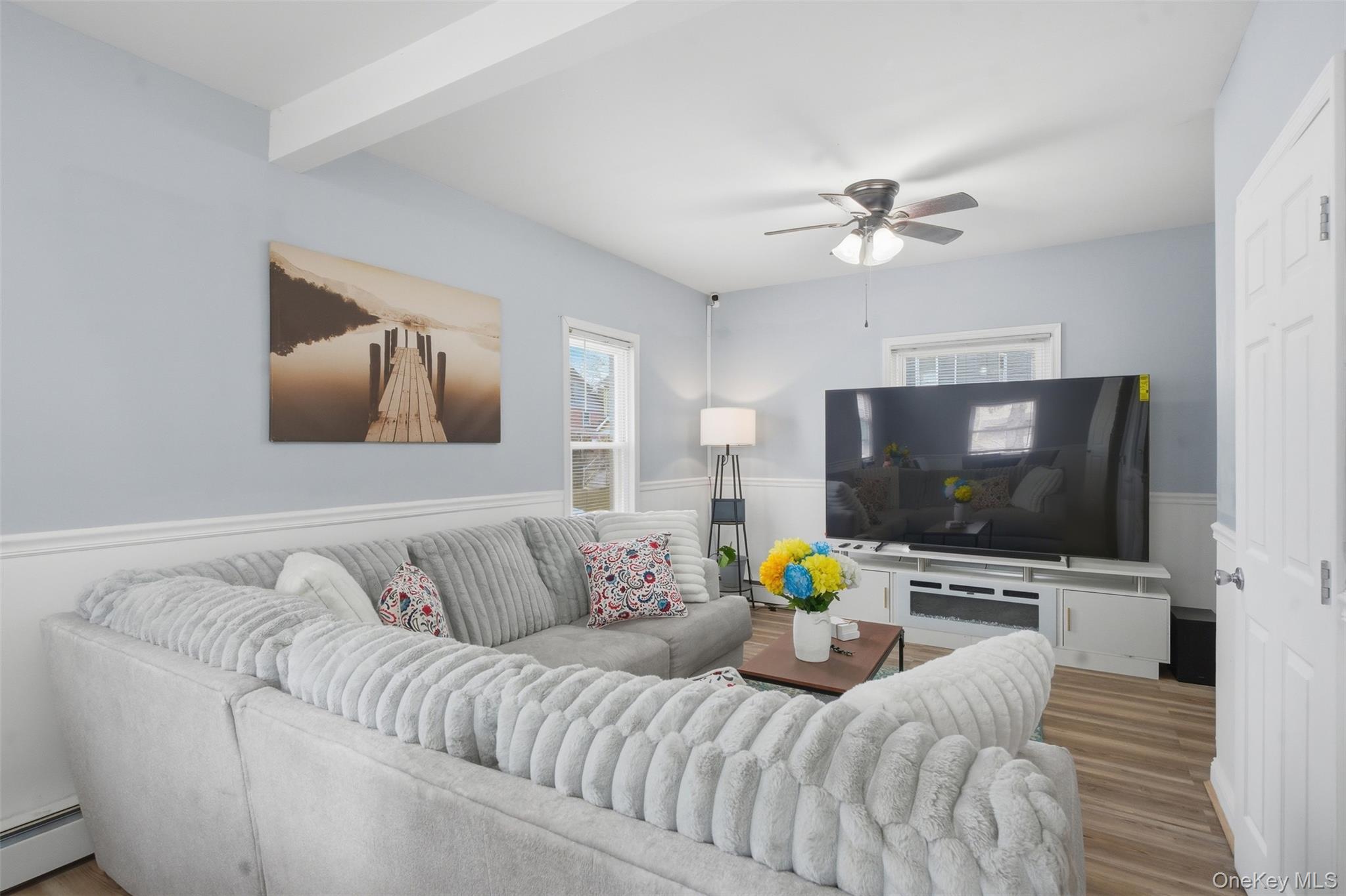 64 Wait Street Walden, NY 12586 - Photo 9 of 26 a living room with furniture and a flat screen tv