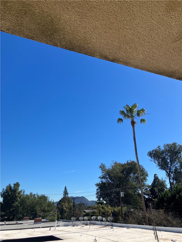 11925 Kling Street, Unit 101 Valley Village, CA 91607 - Photo 16 of 17 a view of a tennis court