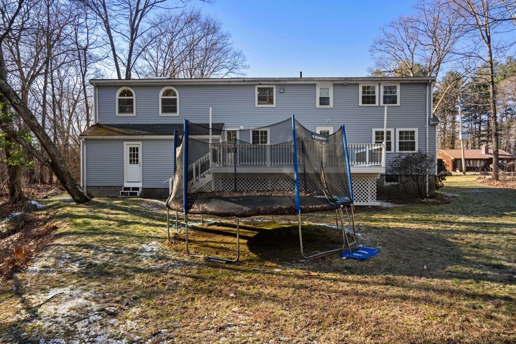 143 Grove Street Lexington, MA 02420 - Photo 31 of 34 a view of a house with backyard