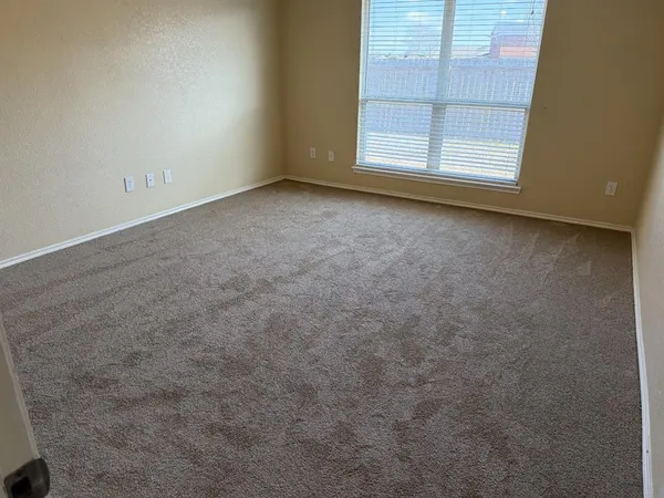 a view of a livingroom with a window