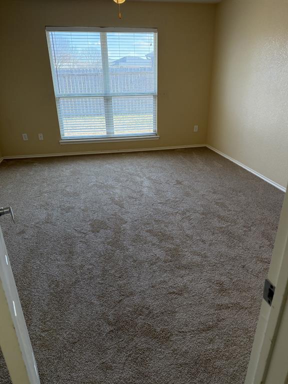 6505 Rienzi Drive Greenville, TX 75402 - Photo 18 of 40 a view of a livingroom with a window