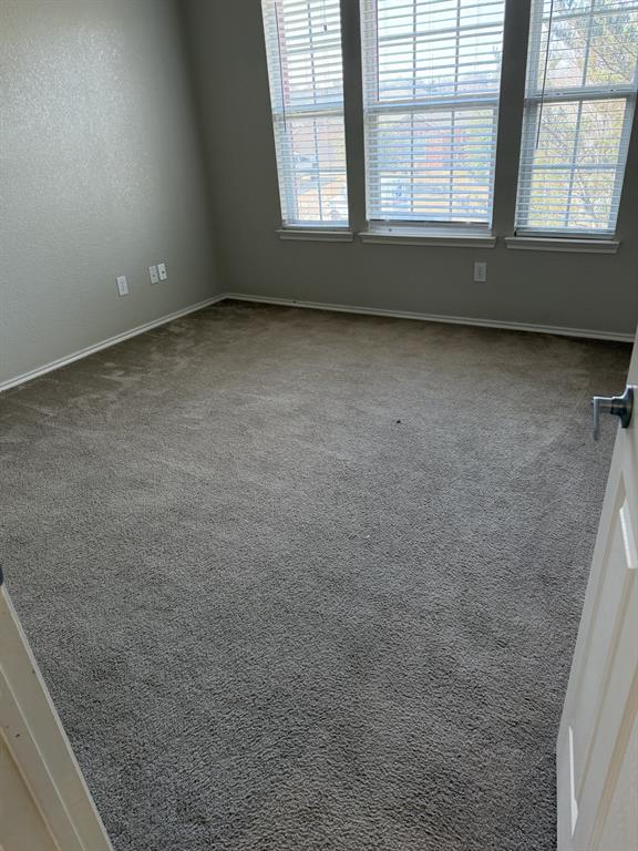 6505 Rienzi Drive Greenville, TX 75402 - Photo 32 of 40 a view of an empty room with a window