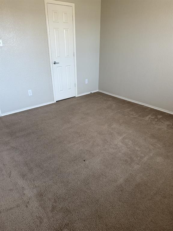 6505 Rienzi Drive Greenville, TX 75402 - Photo 33 of 40 a view of an empty room