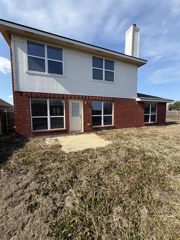 6505 Rienzi Drive Greenville, TX 75402 - Photo 35 of 40 a front view of a house with a yard