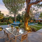 a view of a tables and chairs in a patio