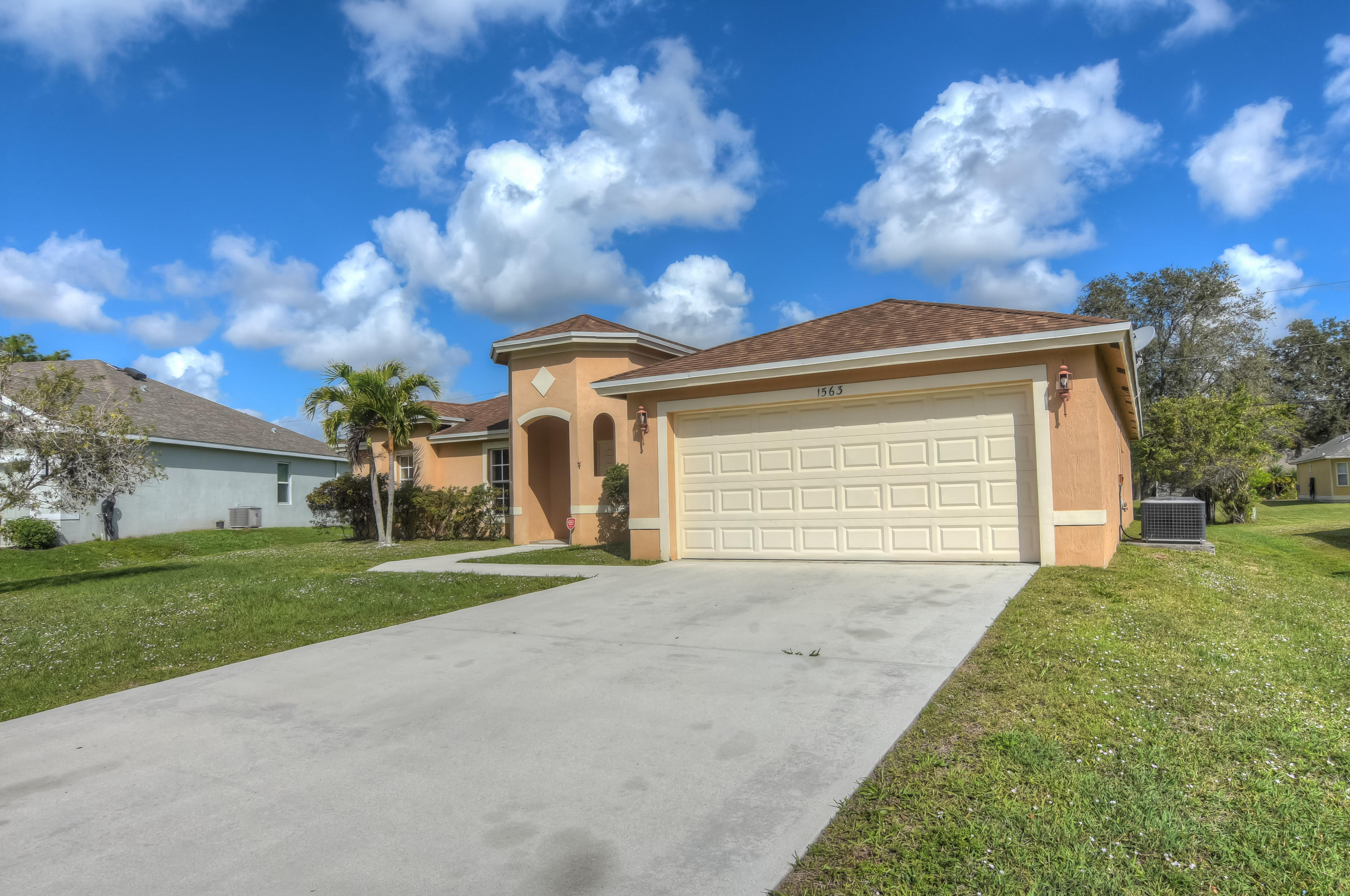 1563 Southwest Fresno Road Port St. Lucie, FL 34953 - Photo 2 of 35 DSC_7617_18_19_20_21