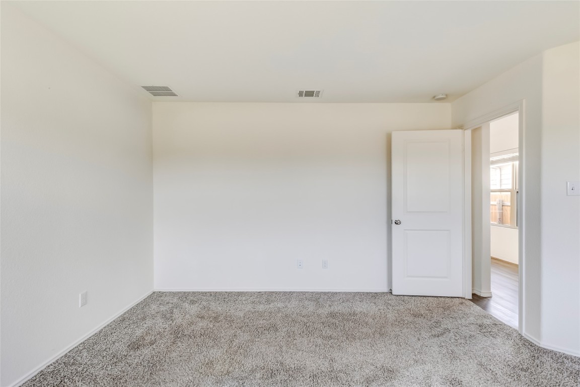 545 Greatest Gift Way Jarrell, TX 76537 - Photo 20 of 34 Spare room featuring carpet flooring