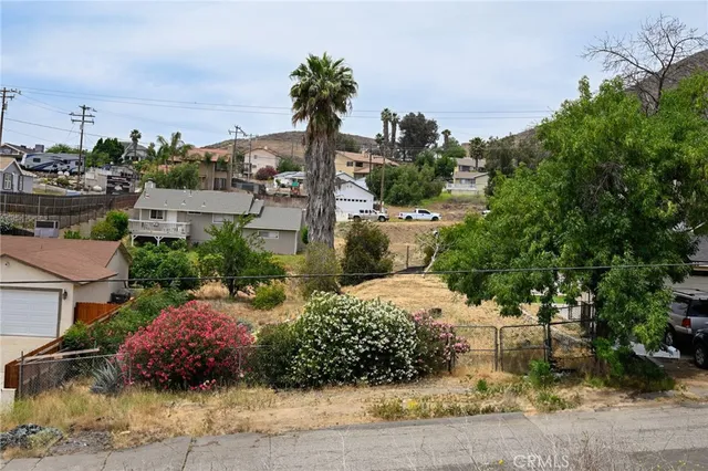 a view of a garden with a fountain
