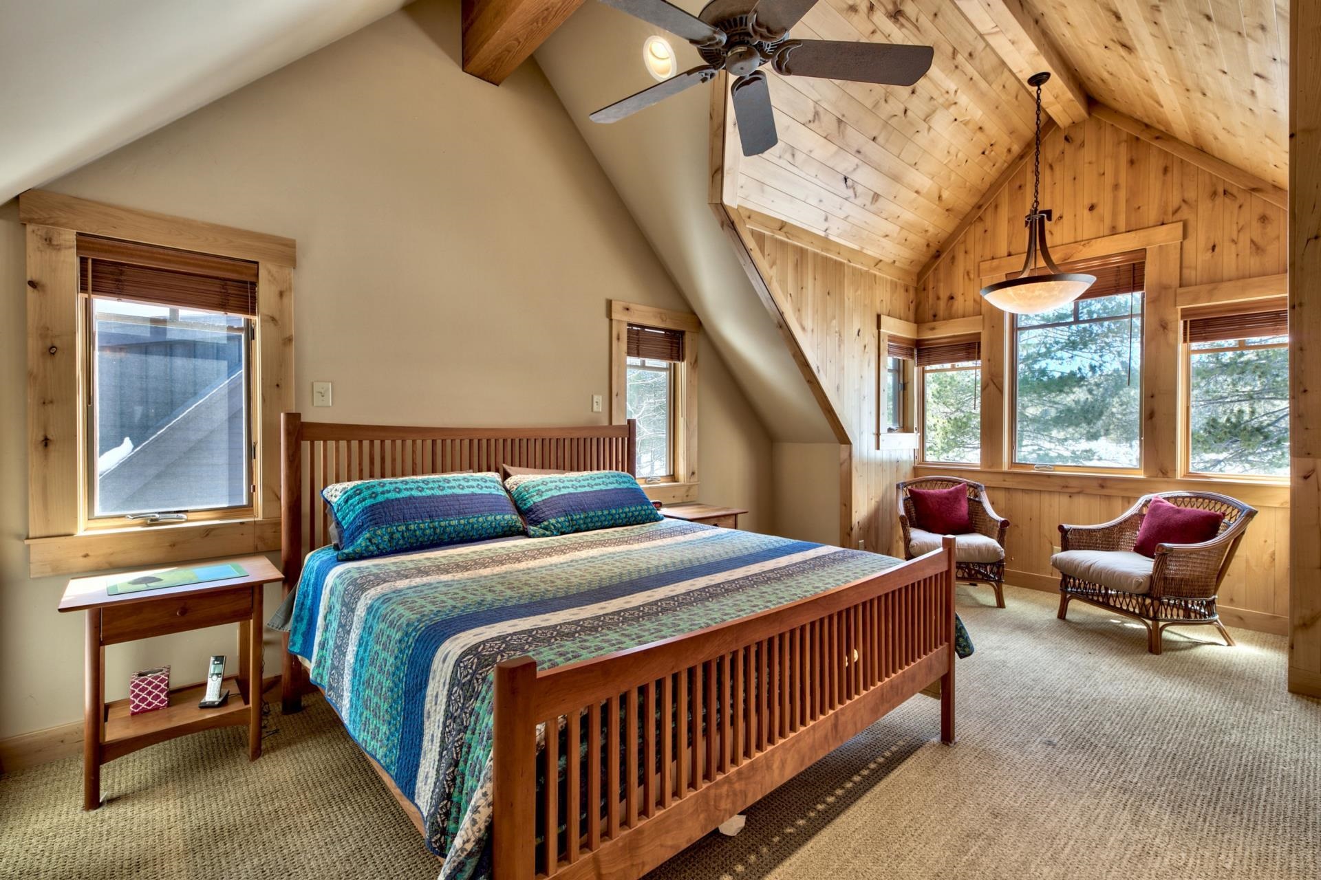 11368 Bennett Flat Road Truckee, CA 96161 - Photo 12 of 21 a bedroom with a bed and windows