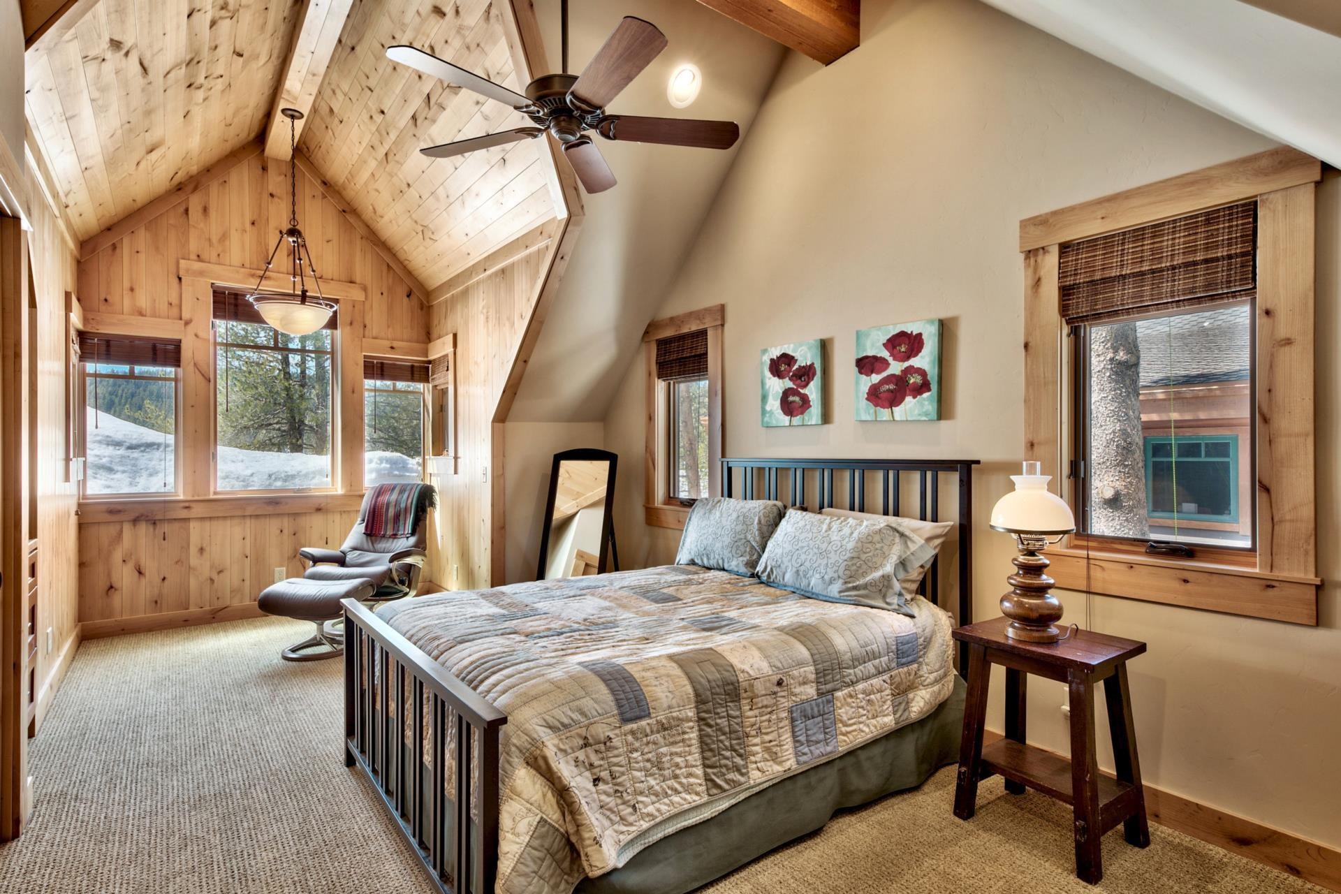 11368 Bennett Flat Road Truckee, CA 96161 - Photo 13 of 21 a bedroom with a bed and a table with the view of balcony