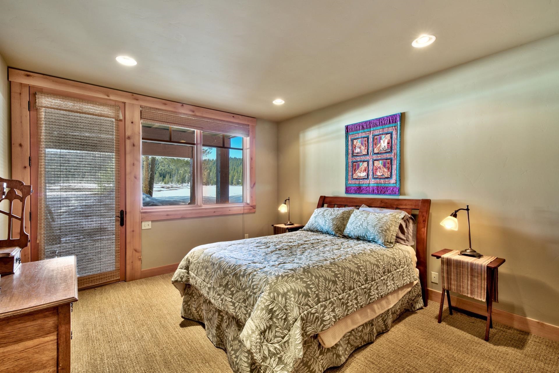 11368 Bennett Flat Road Truckee, CA 96161 - Photo 14 of 21 a bedroom with a large bed and a large window