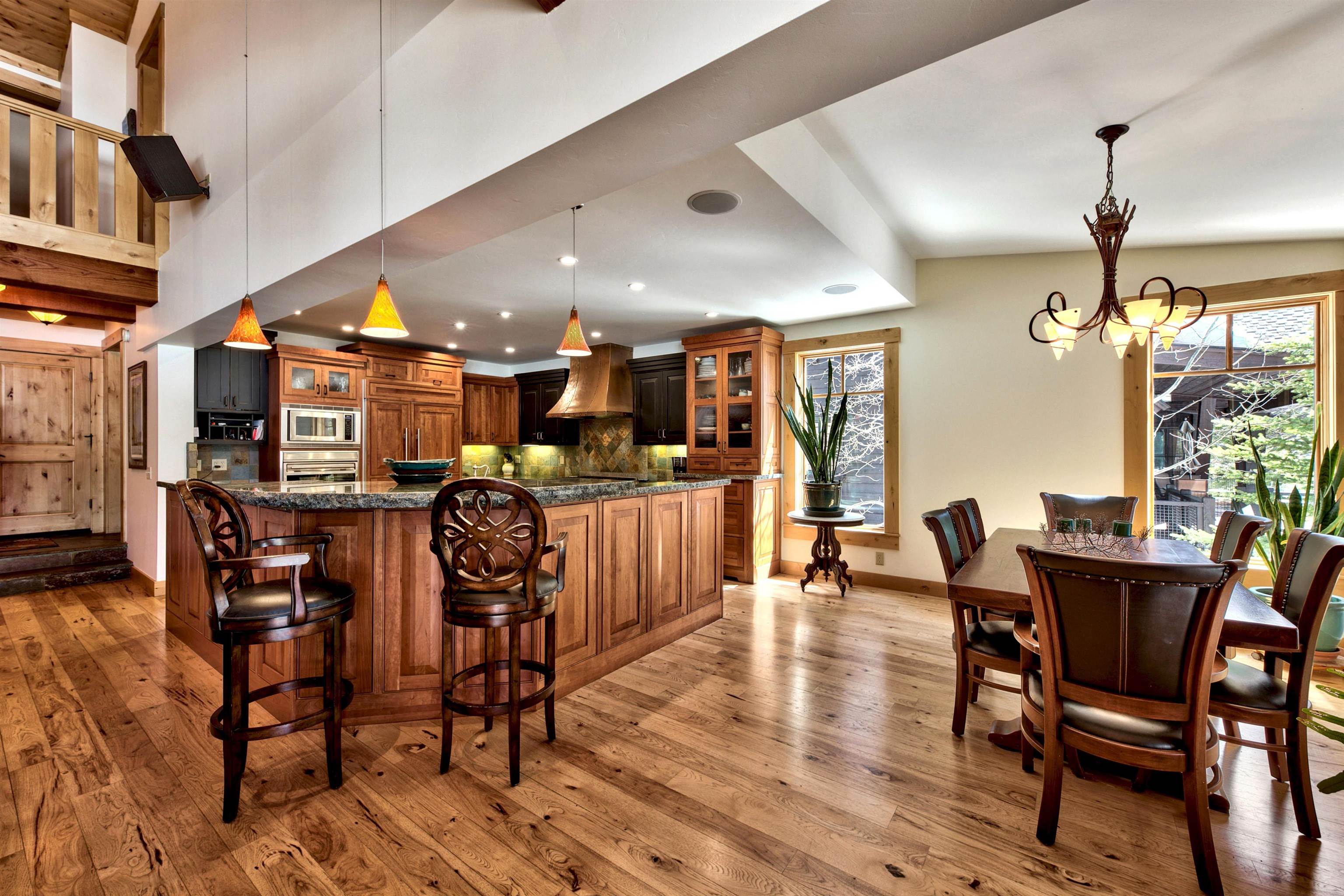 11368 Bennett Flat Road Truckee, CA 96161 - Photo 8 of 21 a view of a dining room with furniture and wooden floor
