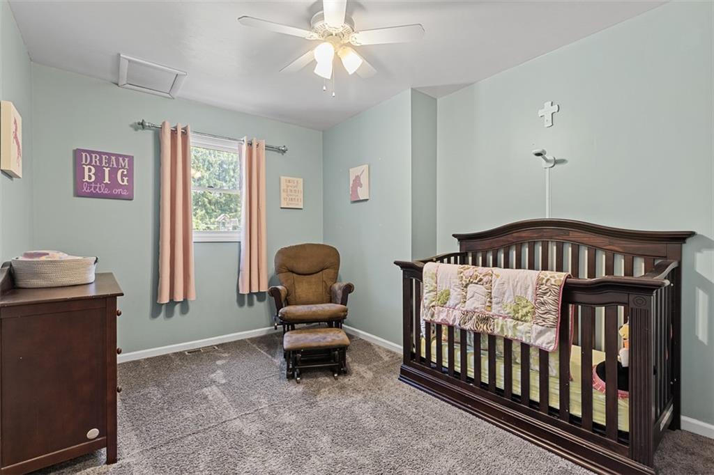 381 Golden Grove Road Baden, PA 15005 - Photo 18 of 38 a bedroom with furniture and a window