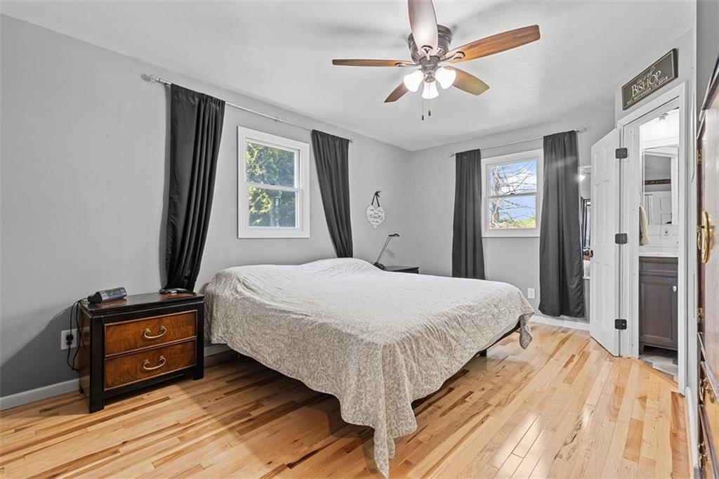 381 Golden Grove Road Baden, PA 15005 - Photo 20 of 38 a bedroom with a bed and a window