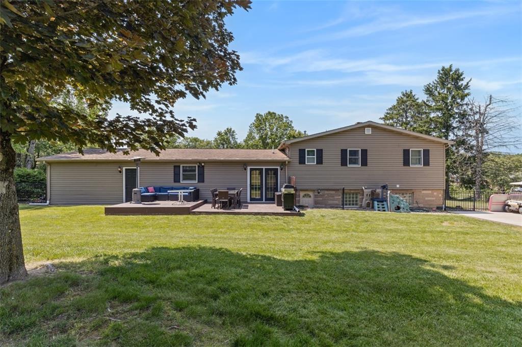 381 Golden Grove Road Baden, PA 15005 - Photo 30 of 38 a view of a house with swimming pool and a yard
