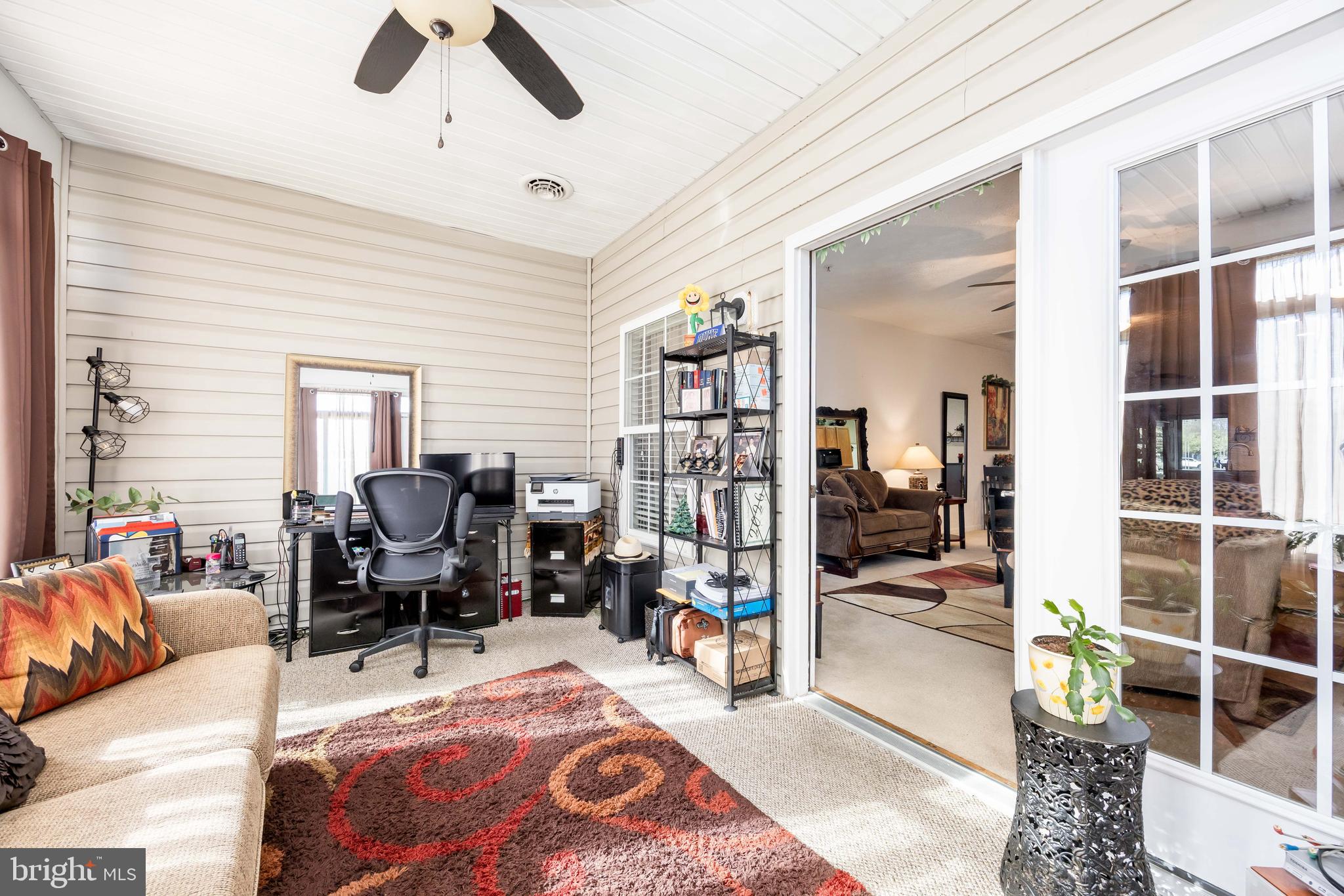 9529 Wedge Way Delmar, MD 21875 - Photo 22 of 39 a living room with furniture lamp and rug