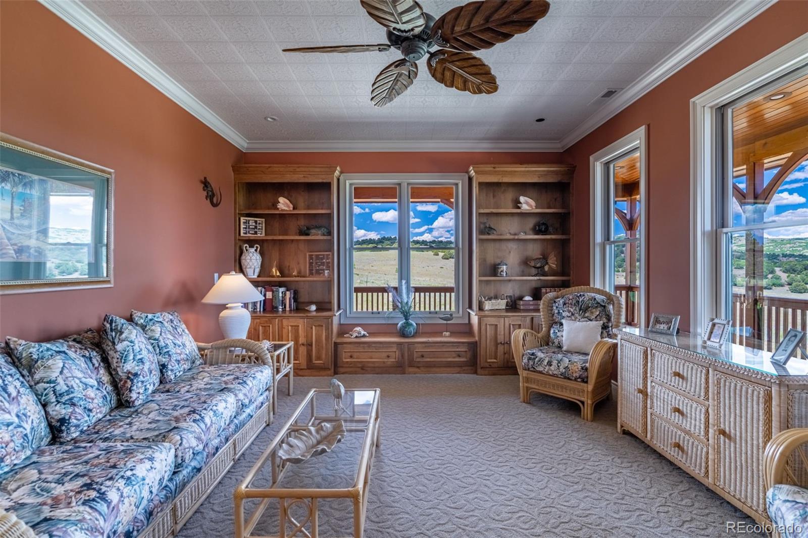 157 Cap Rock Road Canon City, CO 81212 - Photo 14 of 50 a living room with furniture and a large window