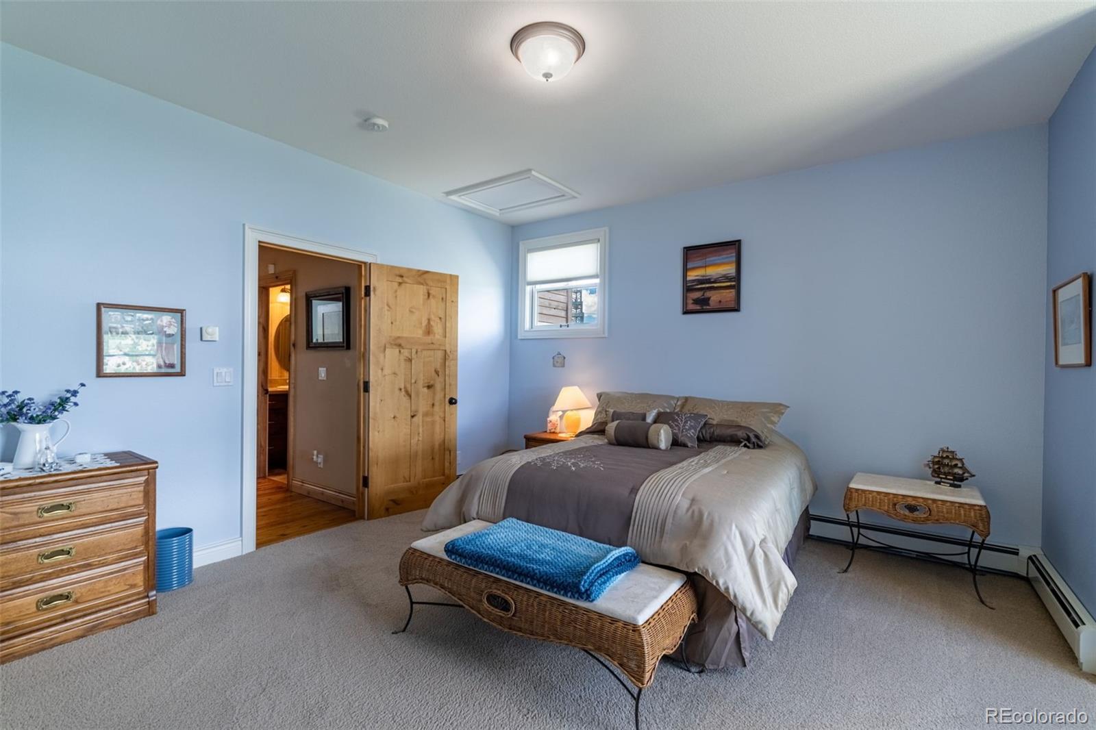 157 Cap Rock Road Canon City, CO 81212 - Photo 27 of 50 a bedroom with furniture and a window