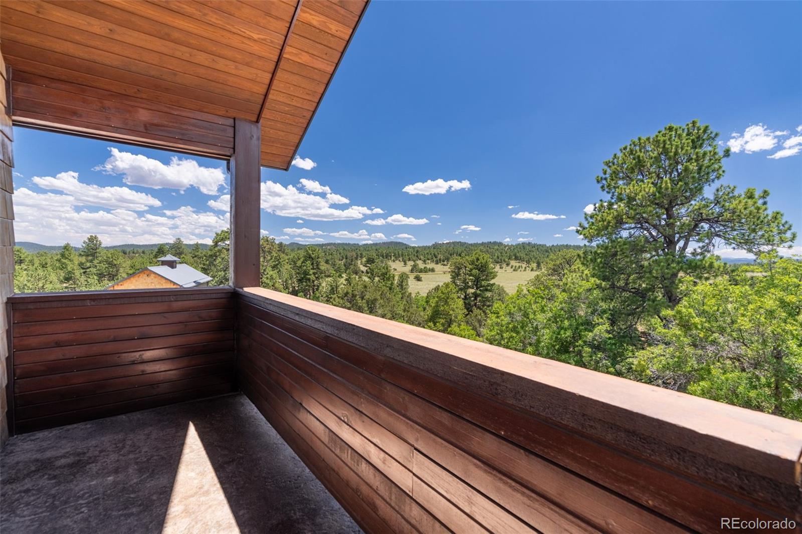 157 Cap Rock Road Canon City, CO 81212 - Photo 32 of 50 a view of balcony with a yard