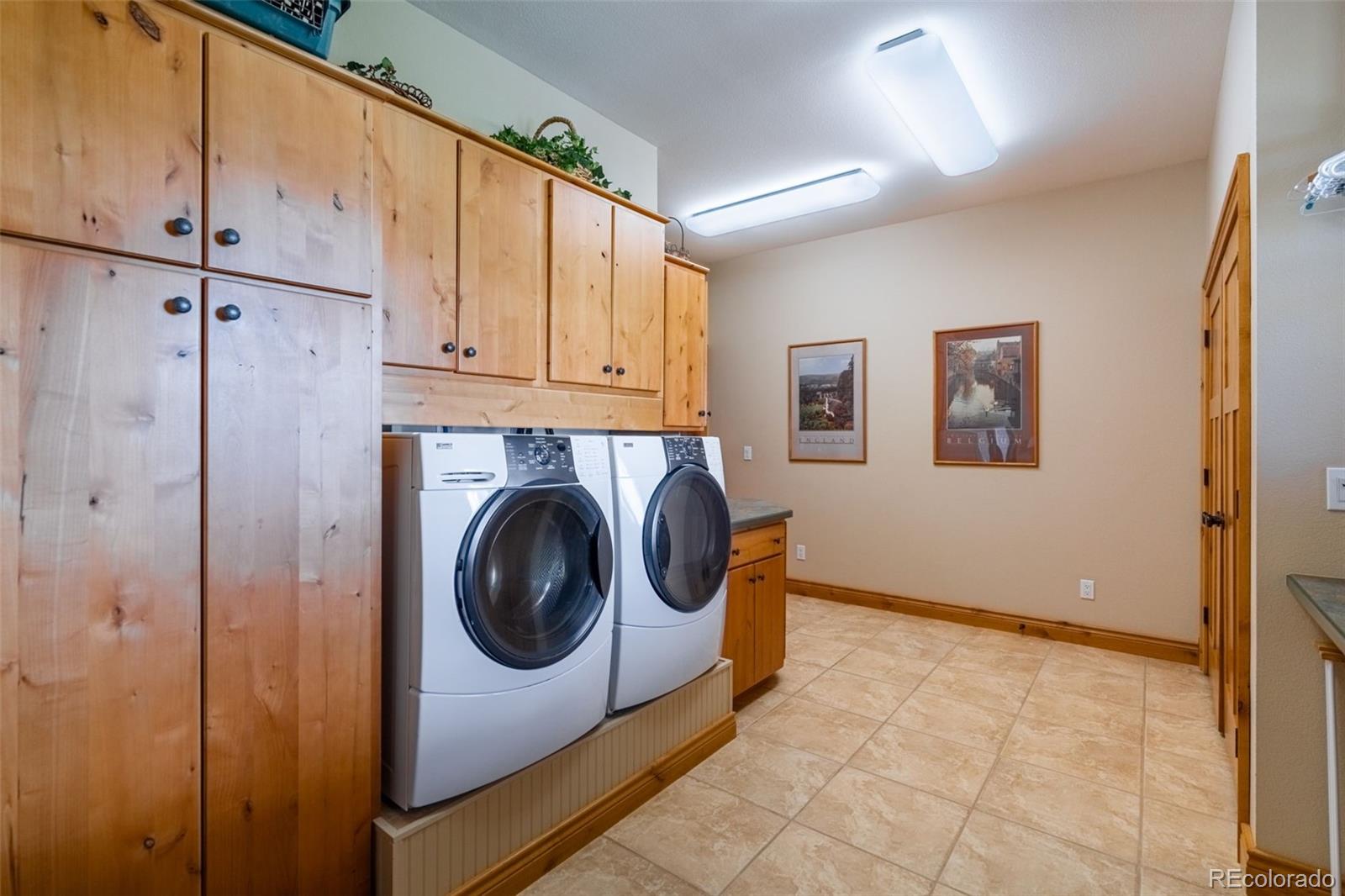 157 Cap Rock Road Canon City, CO 81212 - Photo 39 of 50 a utility room with dryer and washer