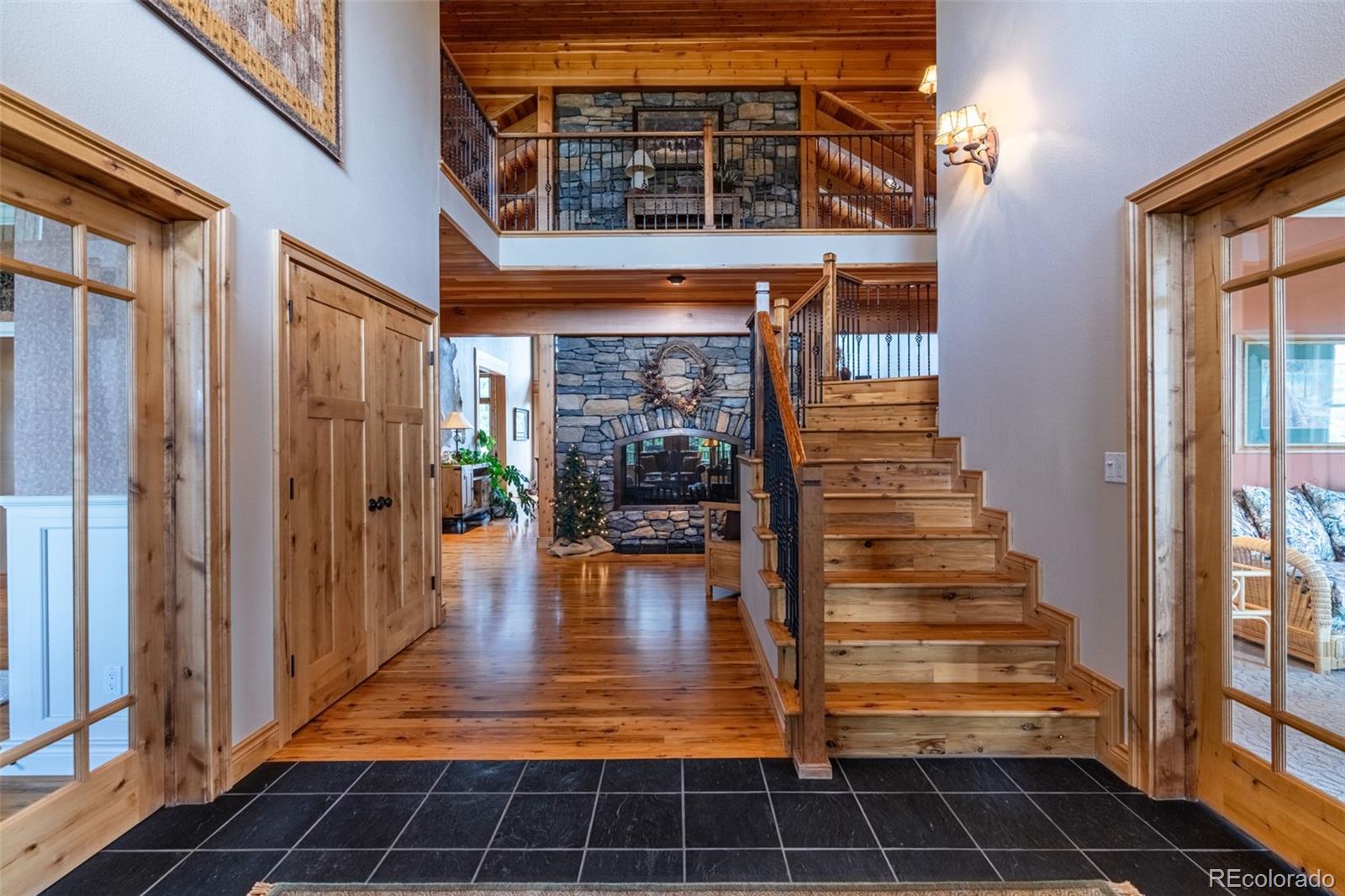 157 Cap Rock Road Canon City, CO 81212 - Photo 6 of 50 a view of lobby with staircase