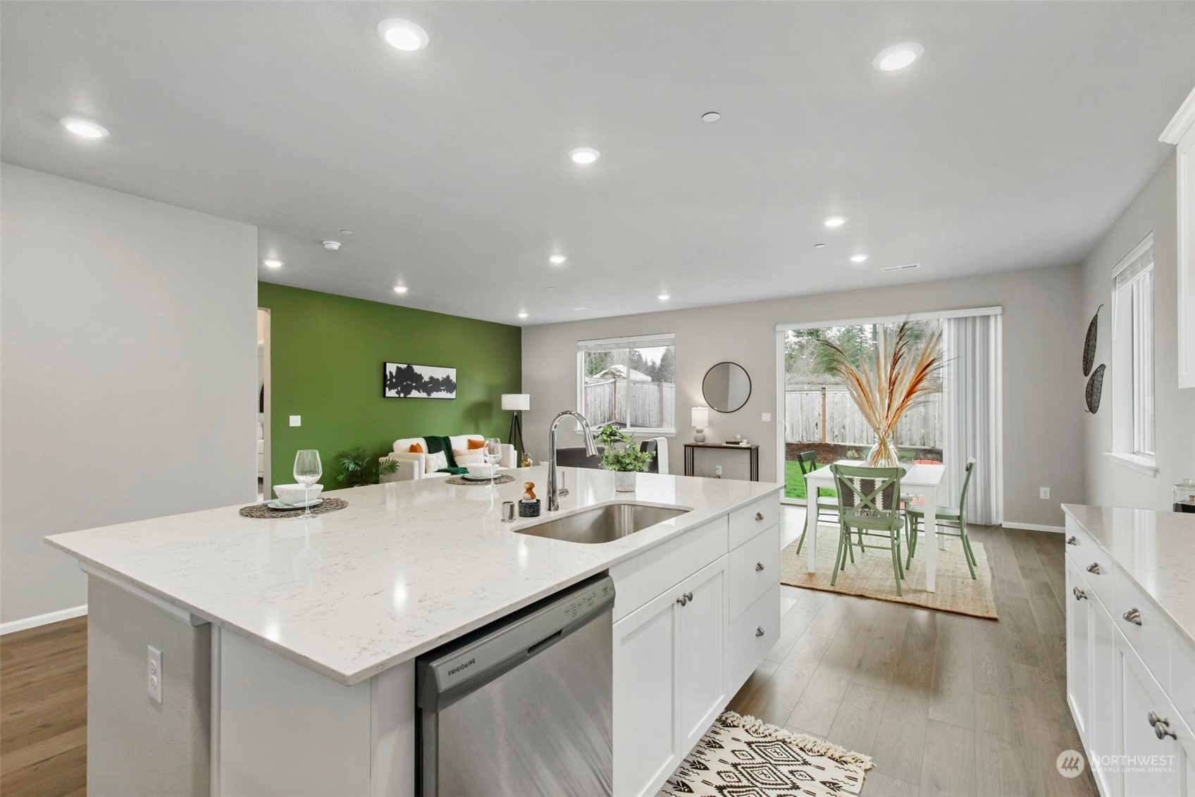 1496 Baker Heights Loop Bremerton, WA 98312 - Photo 12 of 27 a kitchen with sink and view of living room