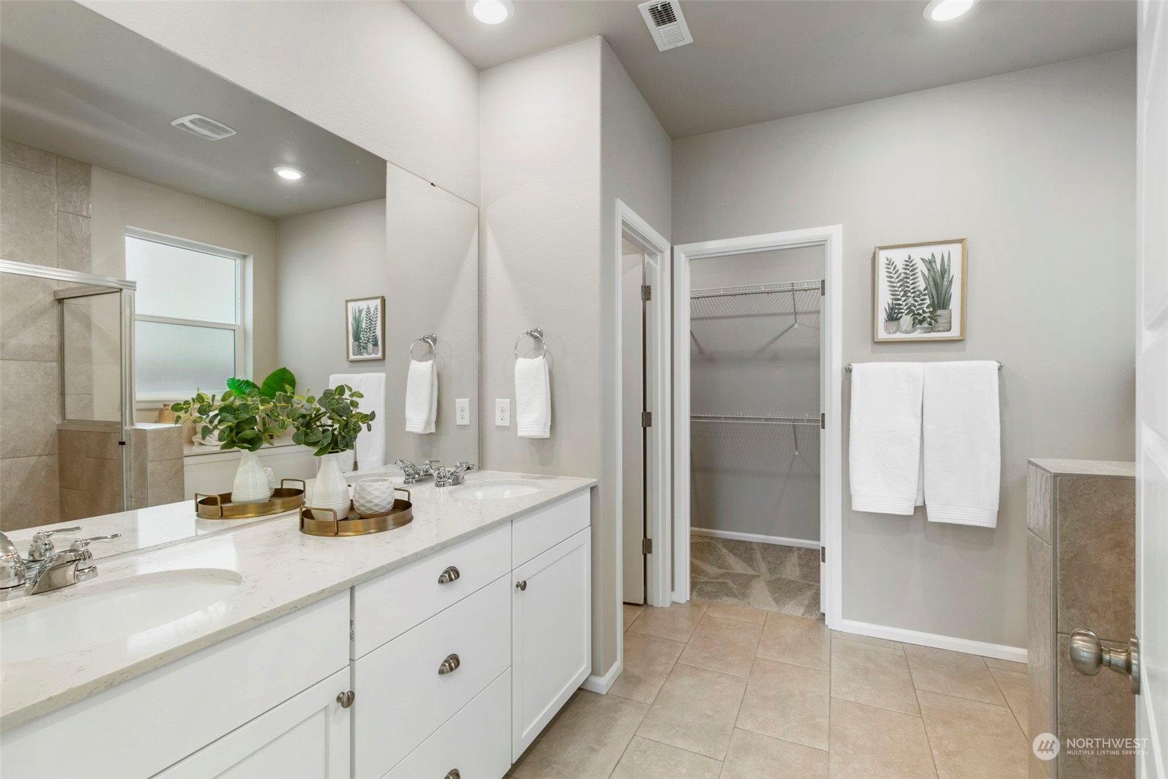 1496 Baker Heights Loop Bremerton, WA 98312 - Photo 15 of 27 a bathroom with a double vanity sink mirror and shower