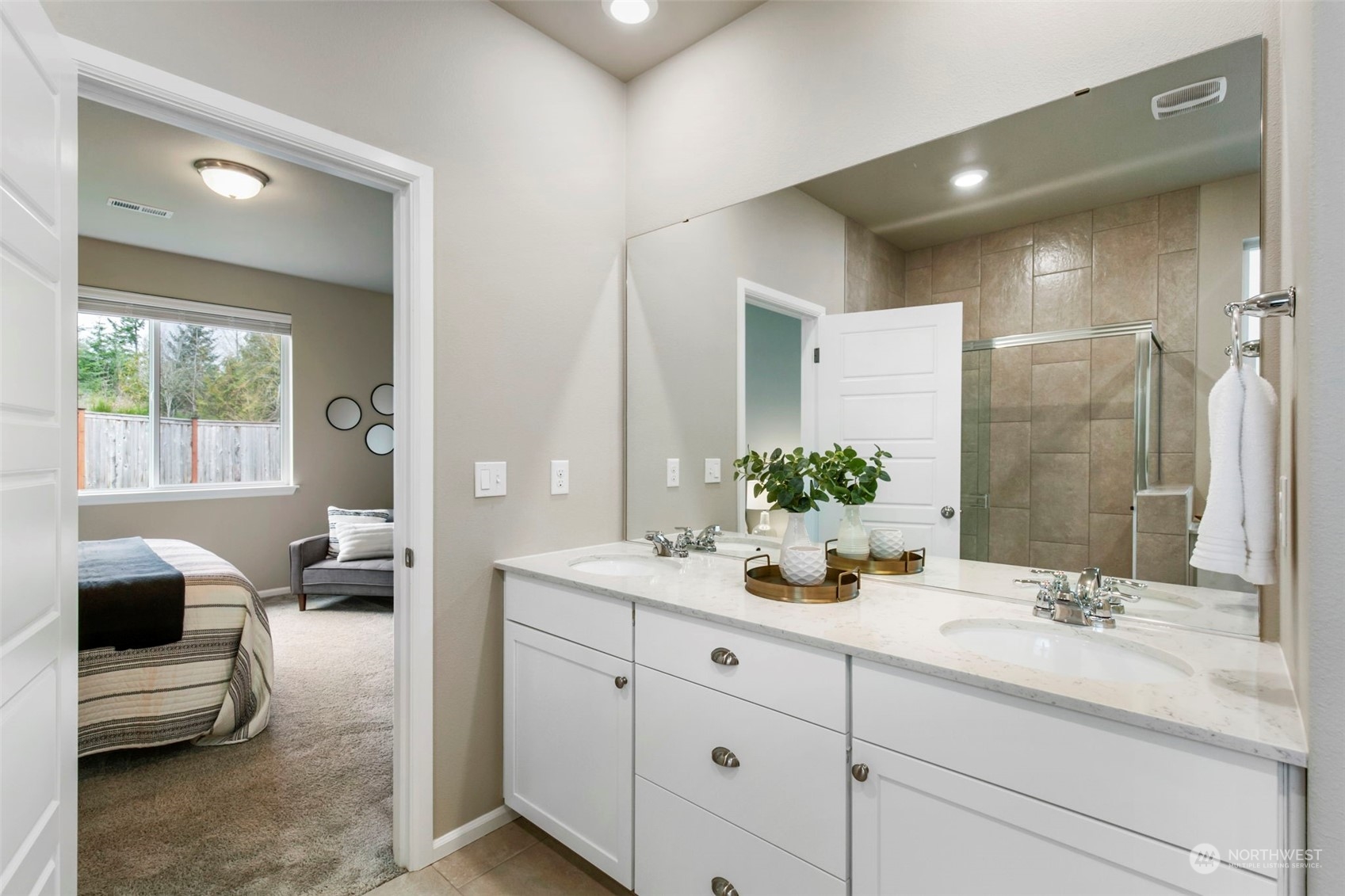 1496 Baker Heights Loop Bremerton, WA 98312 - Photo 17 of 27 a en suite bathroom with a double sink and mirror