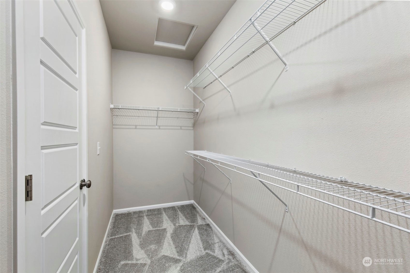 1496 Baker Heights Loop Bremerton, WA 98312 - Photo 18 of 27 a view of a room with racks on the wall