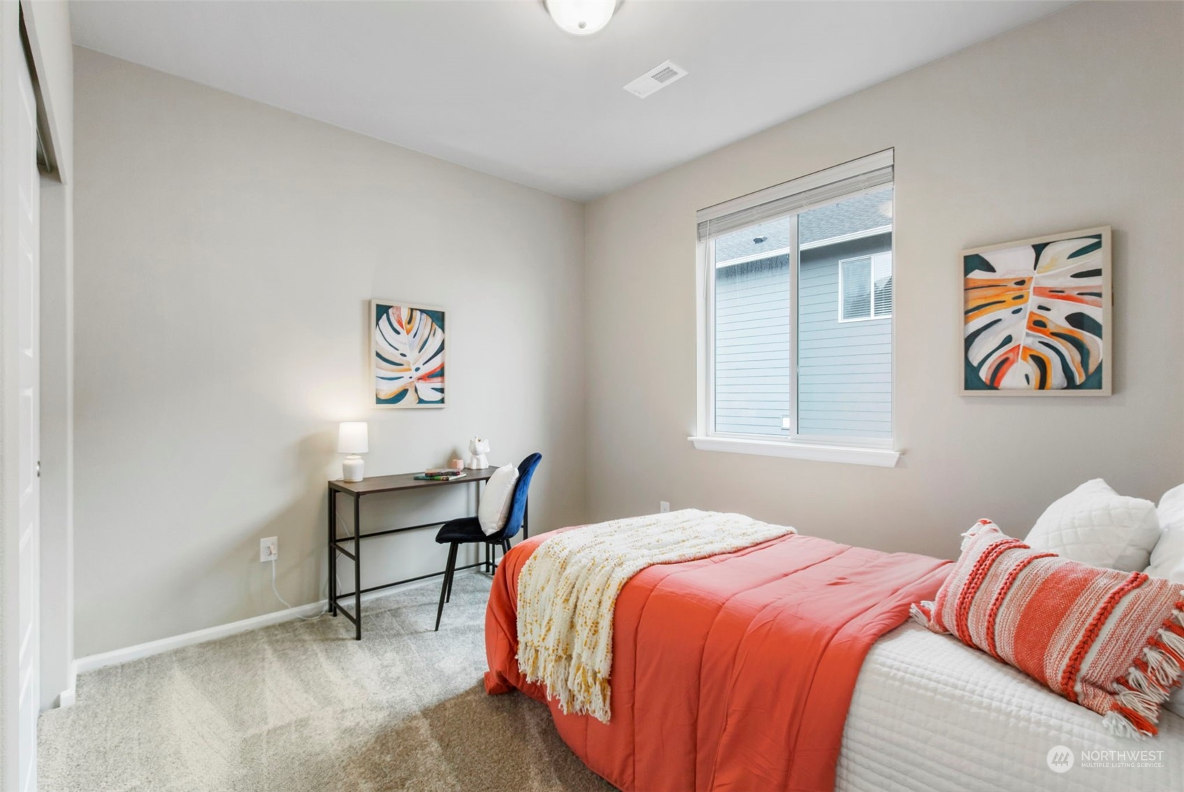 1496 Baker Heights Loop Bremerton, WA 98312 - Photo 20 of 27 a bedroom with a bed and a desk