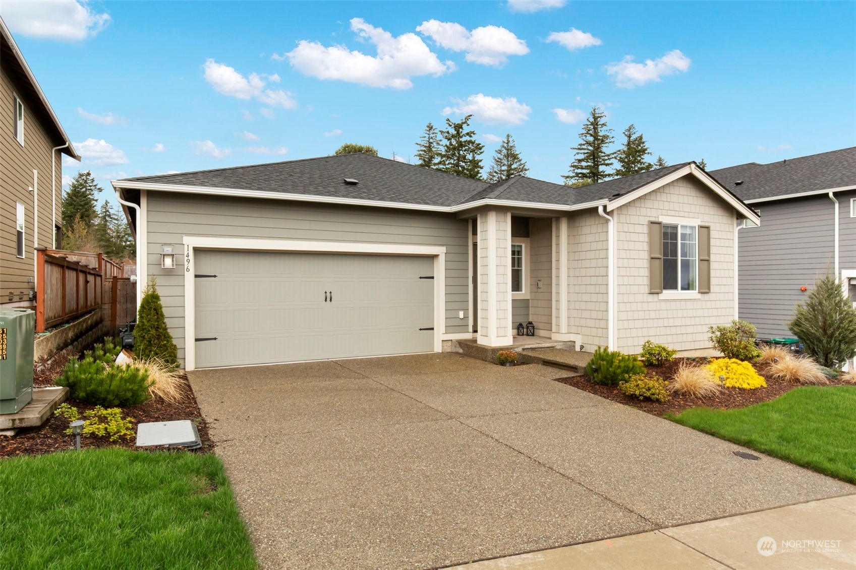 1496 Baker Heights Loop Bremerton, WA 98312 - Photo 2 of 27 a view of a house with a yard