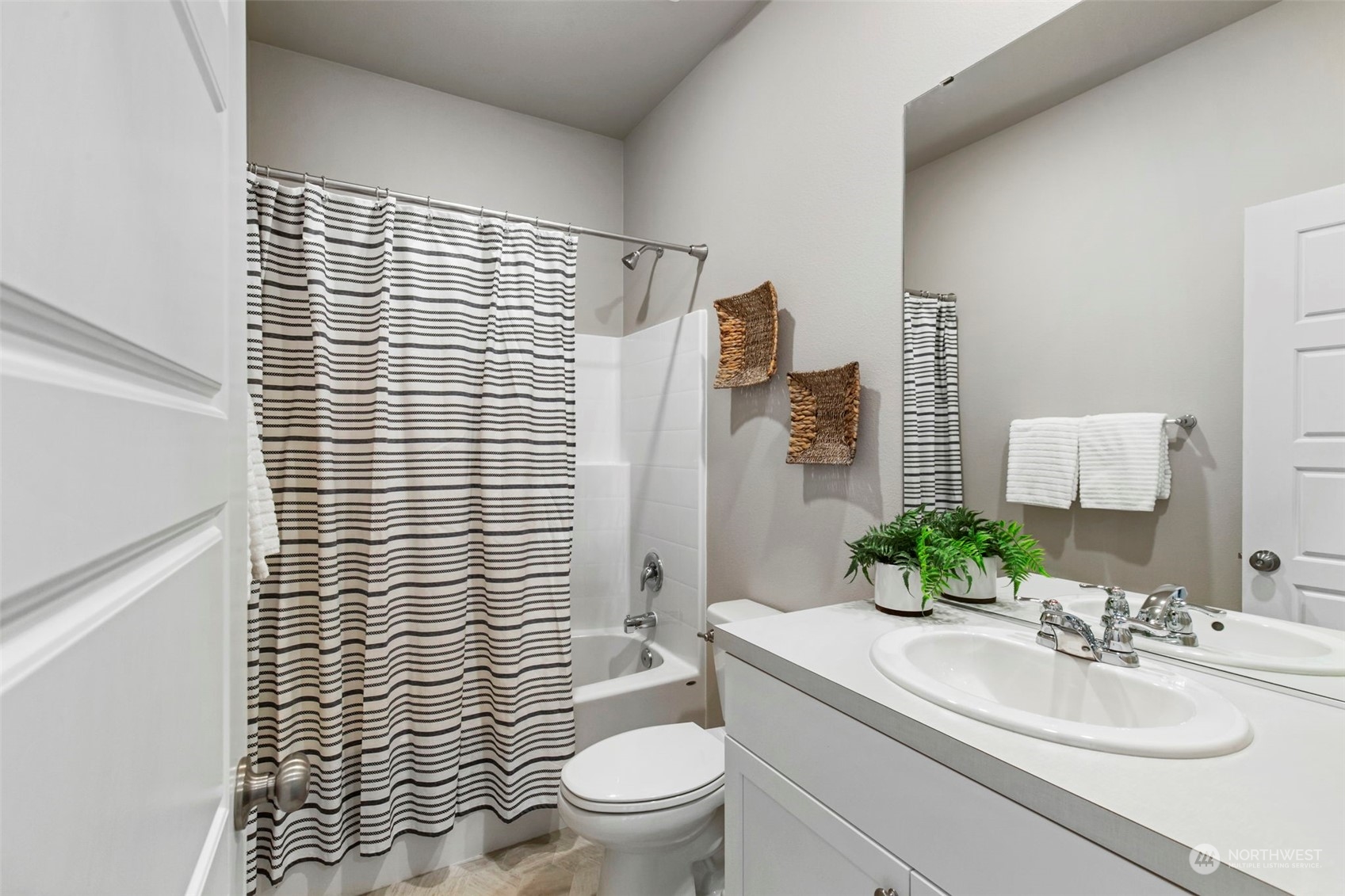 1496 Baker Heights Loop Bremerton, WA 98312 - Photo 21 of 27 a bathroom with a sink toilet and shower