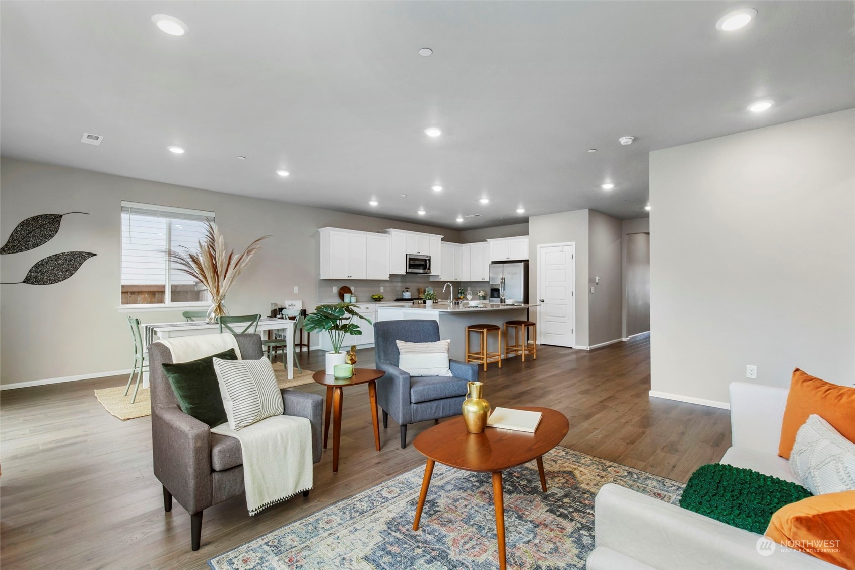 1496 Baker Heights Loop Bremerton, WA 98312 - Photo 7 of 27 a living room with furniture and kitchen view