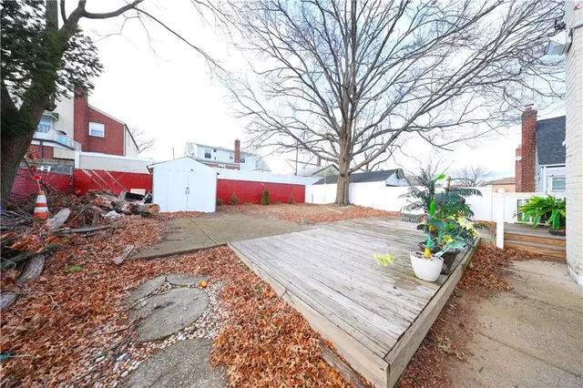 a house with view of trees in front of it