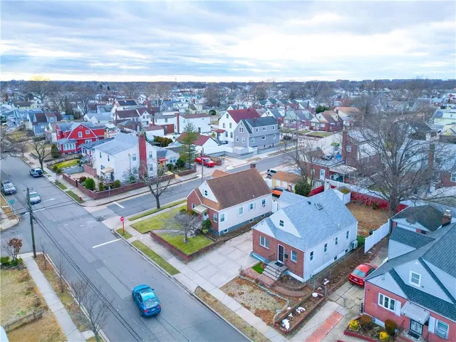 an aerial view of a city with lots of residential buildings