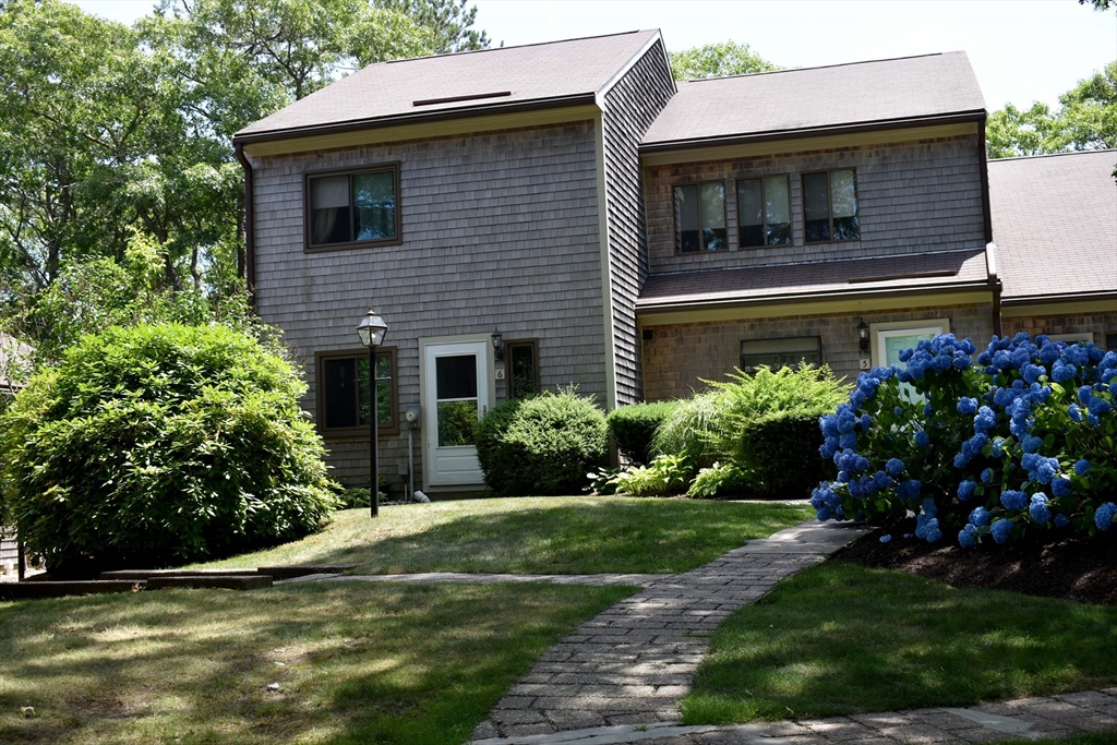 6 Round House Road, Unit 6 Bourne, MA 02532 - Photo 1 of 29 a view of a house with a yard