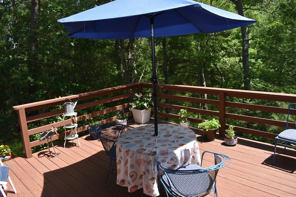 6 Round House Road, Unit 6 Bourne, MA 02532 - Photo 18 of 29 a view of an outdoor sitting area with furniture