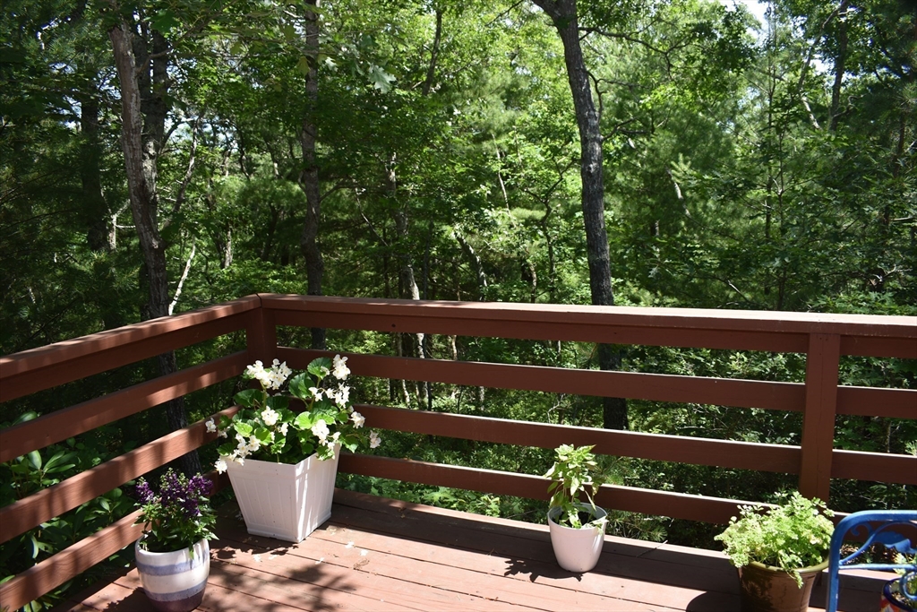 6 Round House Road, Unit 6 Bourne, MA 02532 - Photo 20 of 29 a view of table and chair in the garden