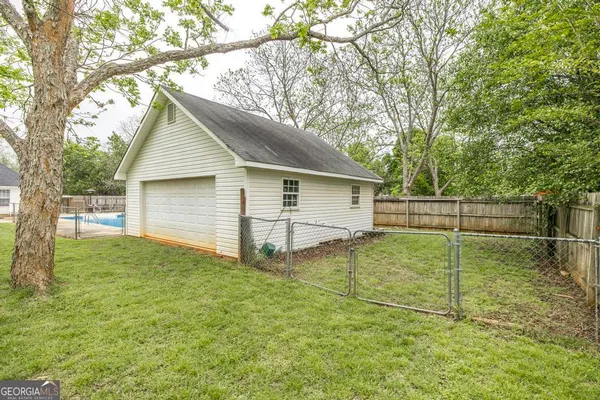 a view of a backyard with a garden