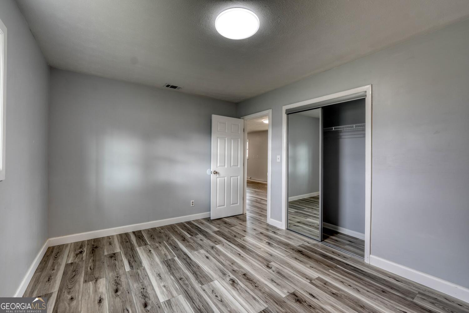 16 Antioch Church Road Blairsville, GA 30512 - Photo 20 of 36 wooden floor and an entryway in a room